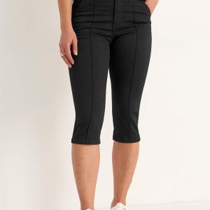 Elastiske crop jeans med syet pressefold